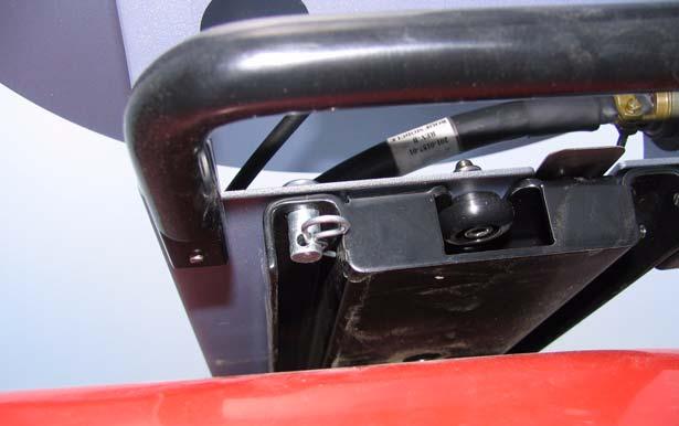 Insert and close the locking pin through the holes in the roof module and the mounting rail. Note that a padlock can replace the locking pin. locking pin Attach the radio modem antenna.