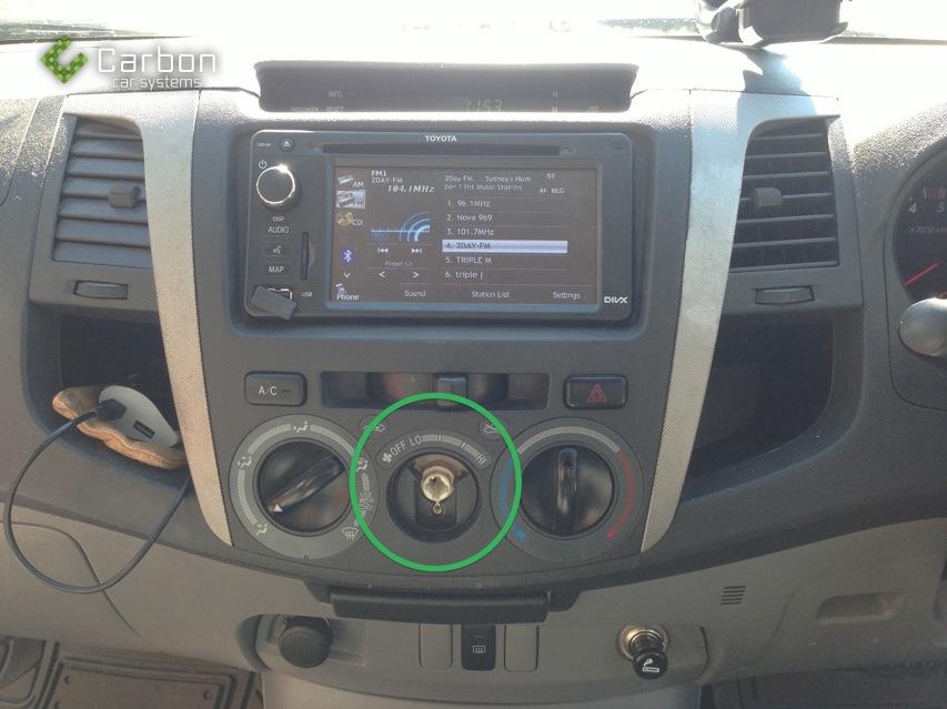 2006-2011 Model Toyota Hilux Remove the dial from the centre of the stereo surround.