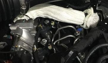 4. Remove the EGR valve outlet pipe to Intake plenum (4 screws) as shown (see Figure 2).