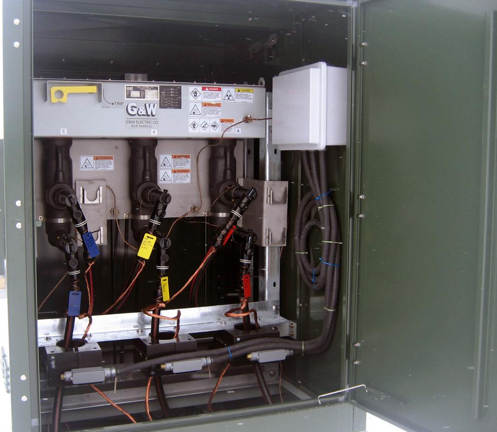 Separate compartments are provided for accessing the cables and operators.