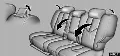 Folding down rear seatbacks Lower the head restraints to the lowest position, unlock the seatbacks and fold them