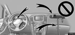 16R354 16R355 Do not put objects or your pets on or in front of the dashboard or steering wheel pad that houses the front airbag system.