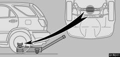 CAUTION 61R011 Rear (two wheel drive models) When jacking, be sure to observe the following to reduce the possibility of personal injury: Follow jacking instructions.