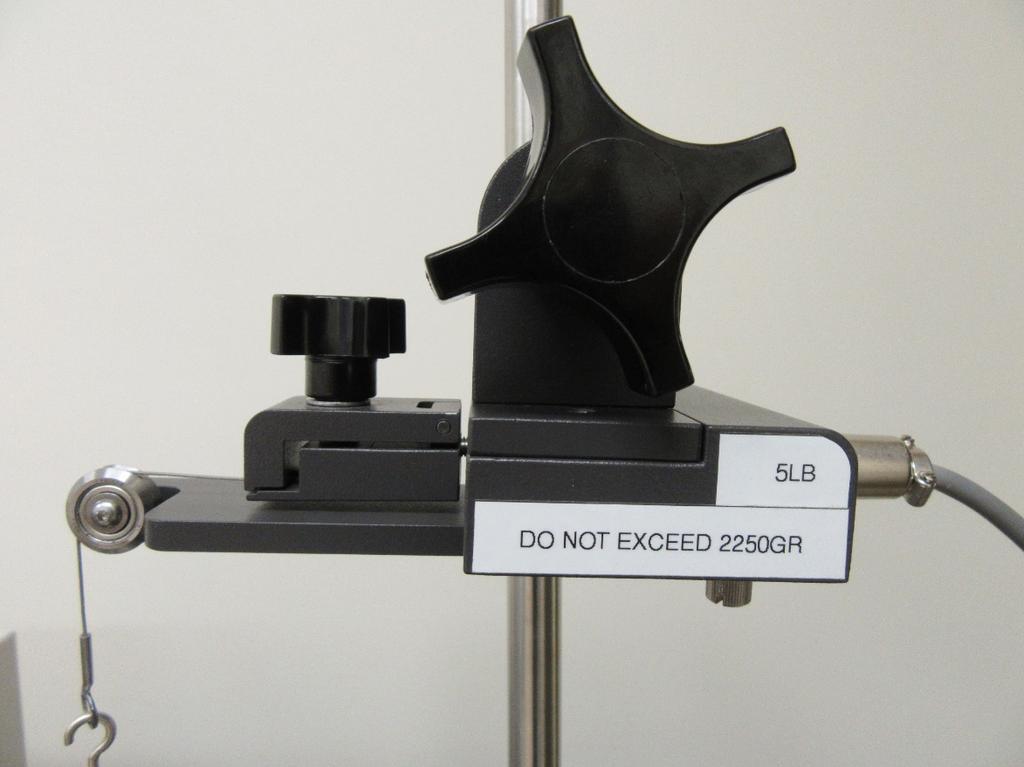 LOAD CELL measures the forces involved with an Adhesion/Release test. LOAD CELL ASSEMBLY consists of the mounting bracket for the load cell with grip.
