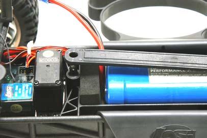 Battery Pack(s): To install the battery pack remove the battery hold-down strap by removing the clip from the front mounting boss, and
