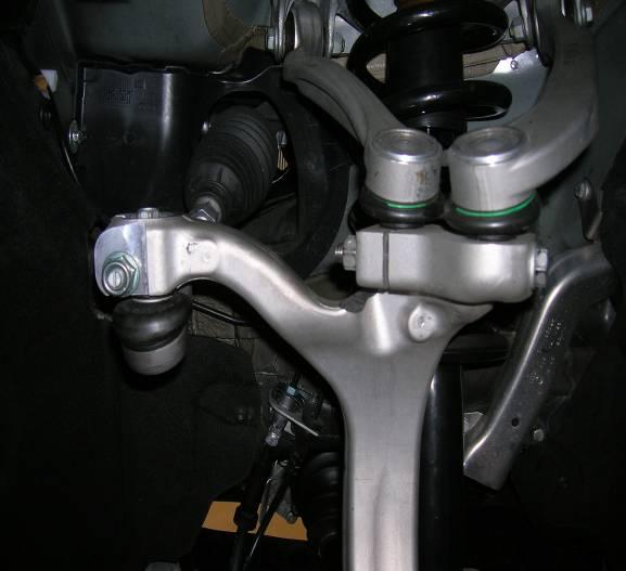 7 A) Remove top bolt for steering arm B) Remove pinch bolt nut NOTE: Do not allow bolt to back out or turn.
