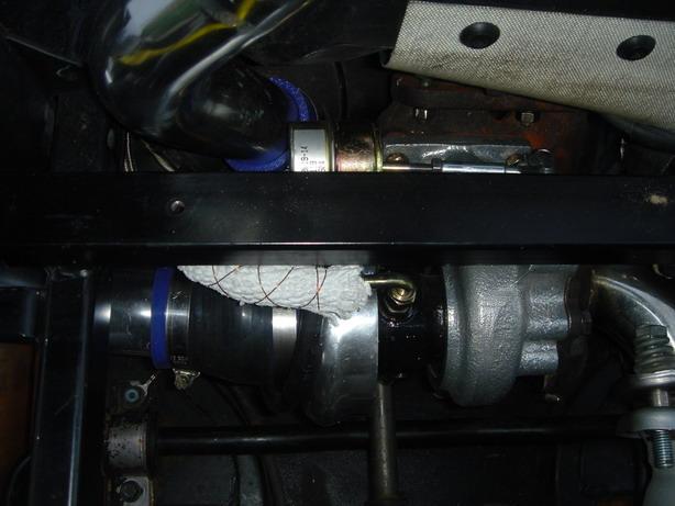 13. Reinstall the air filter box onto the carburet and secure the air box to the L brackets. using the hose included reconnect the breather outlet to the air box.