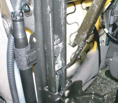 11. Line up the ends of the replacement slide bar with the rail locks. RAIL LOCK SLIDE BAR END No Reverse After A/T R&R?