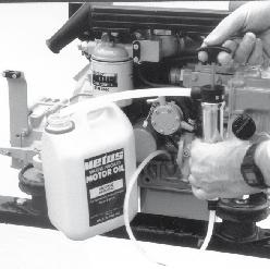 4 Maintenance Engine oil change Every 100 operating hours. 12 Engine oil change Change the engine oil every 100 hours of operation (together with engine oil filter replacement).