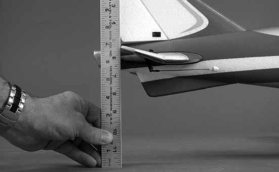 Pushrod Farther Out Pushrod Closer In MORE THROW LESS THROW Use a ruler at the widest part (front to back) of the trailing edge of each control surface to measure the throws, then adjust as necessary