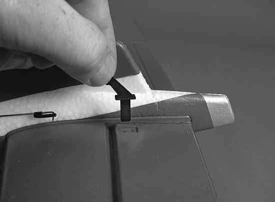 Slide the horizontal stabilizer (stab) into the fuselage,