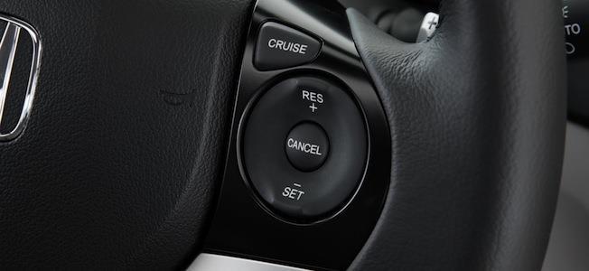 Cruise Control Cruise control is a servomechanism system that automatically takes over the throttle of the car and controls the speed of a motor vehicle by maintaining a steady speed as set by the
