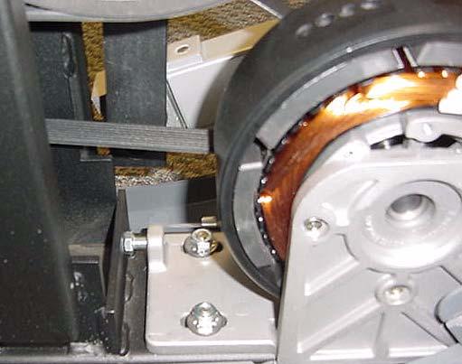 When the adjustment is complete the step up pulley shaft must remain perpendicular to the frame and drive belt.