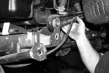 Remove the front tires. 2. Disconnect the sway bar end links from the frame and sway bar, discard the endlinks, save the hardware.