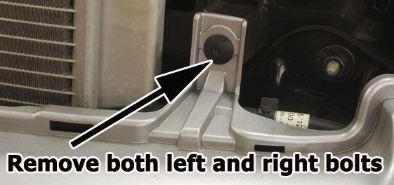 4. Locate (2) Torx Screws behind grill and remove.