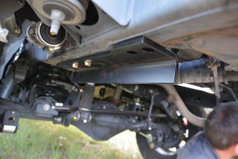 Install the 3/8 frame braces using the supplied m8 metric bolts as shown. Leave these bolts loose. With the help of a couple of friends, carefully install the bumper onto your truck.