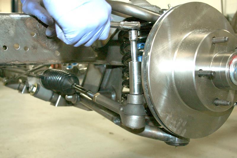 Install the jam nut and outer tie rod end onto both sides of the rack.