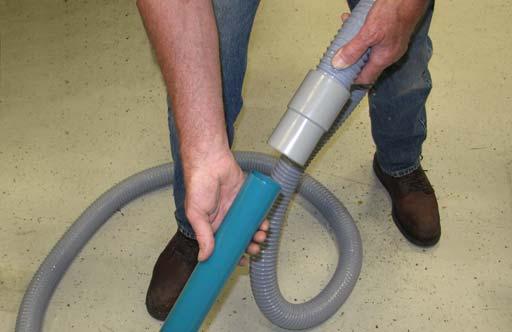 The vacuum hose and wand allow pick-up of debris that is out of reach of the machine. 1.