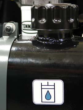Machines have a blue colored drop (left photo) on the hydraulic fluid label if originally equipped with TennantTrue premium hydraulic fluid.