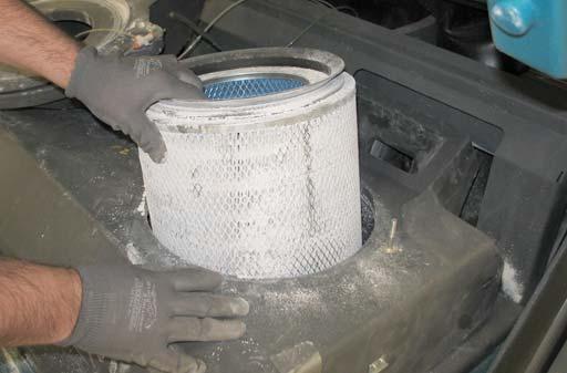 filter from the machine. Inspect and clean the filter after every 100 hours of operation.