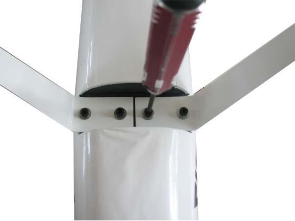 Secure the wire in place by tightening the set screw in the side of the needle valve.