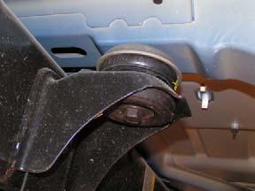 b. Remove bolt and lower bushing from each cab mount on passenger side. Bolt Lower Bushing Remove Bolt From These Mounts 2. Cab passenger side a.