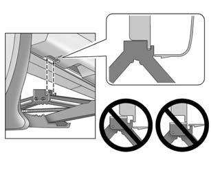 5 cm (12 in) from the front tire or about 27 cm (10.5 in) from the rear tire. Triangle Shown, Without Similar The triangle may be located near each wheel on the vehicle's exterior.