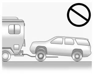 10-74 Vehicle Care { Caution Do not tow a vehicle with the front drive wheels on the ground if one of the front tires is a compact spare tire.