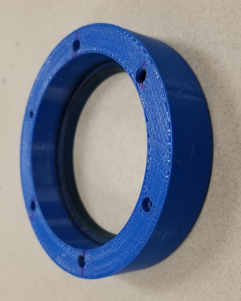 Motor Retention Ring 3-D printed from ABS plastic in-house Held to fin can using two 6-32 screws