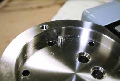 Apply a light coating of nickel anti-seize to all threaded components prior to reassembly. Refer to Table 3 for bolt torque specifications.