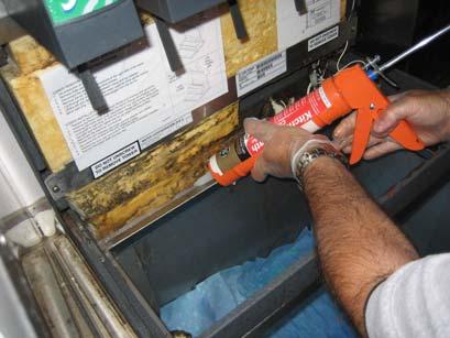 16. Fit the upper barrier over the manifold, making sure that it fits flush to the foam.