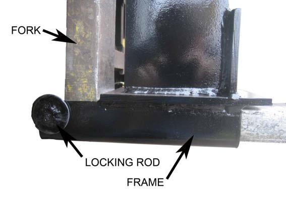 Insert the forks through a set of fork tubes until completely seated against the frame 5. Insert the two locking rods through the holes in the frame.