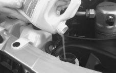3. Fill the radiator with the proper DEX-COOL coolant mixture, up to the base of