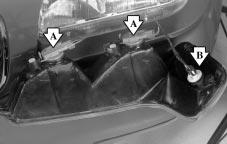 Remove the two screws on the side of the parking/turn signal bulb assembly. The parking/turn signal assembly must be removed to provide clearance for headlamp removal. A. Turn Signal Bulb B.