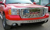 in custom designed stainless steel grill covers and mud flaps.