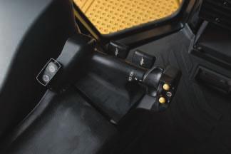 Implement and Steering Controls Low effort control functions significantly reduce operator fatigue for increased performance. Dozer Control Lever.