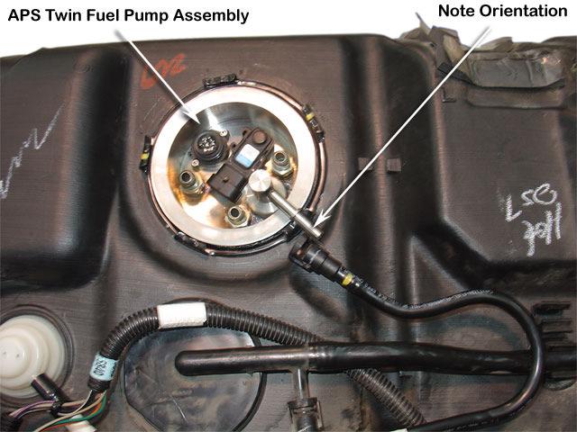 14 Carefully lower the fuel pump assembly
