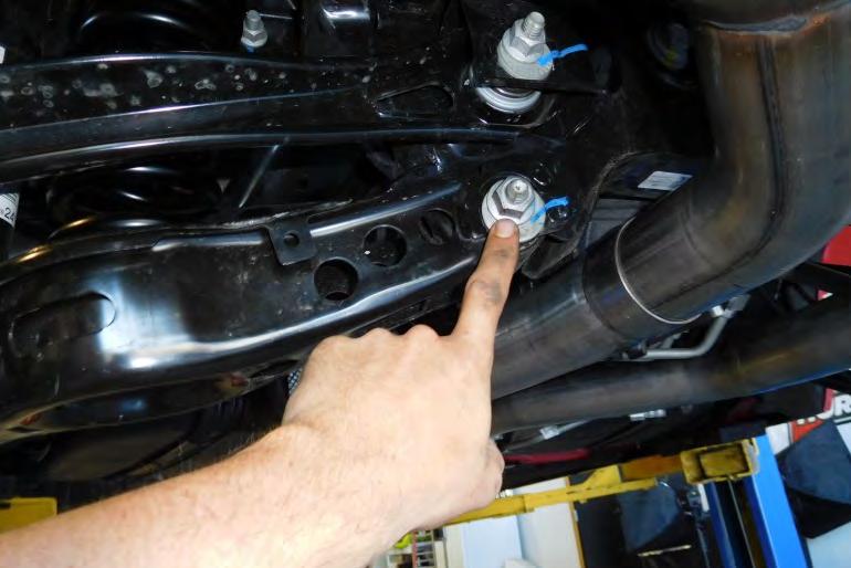 6. Make an alignment mark on the inner rear control arm washer