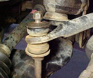REMOVE THESE TWO BOLTS THAT HOLD THE BRAKE LINE AND ANTI LOCK BRAKE WIRE TO THE STEERING KNUCKLE AND UPPER CONTROL ARM, SAVE THIS HARDWARE. 4.
