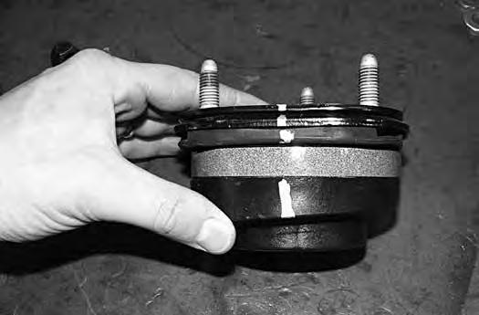 Figure 19 48. Reassemble the strut as it was taken apart by aligning the index marks made earlier. Fasten the assembly with the OE strut nut. Torque nut to 50 ft-lbs. 49.