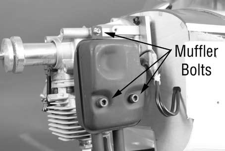 Secure the fuel line to the carburetor fitting using a small tie-wrap. Be sure to secure the ignition wire away from the hot cylinder head using a tie wrap.