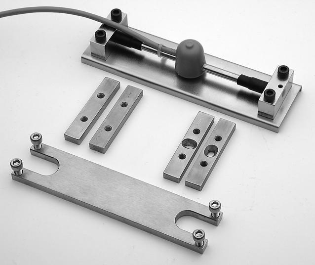 Installation Notes Components Strain Gauge on Transport Plate Weld-On Mounting Plates Installation Tool Screw-On Mounting Plates Strain Gauge: The strain gauge is supplied on a transport plate.
