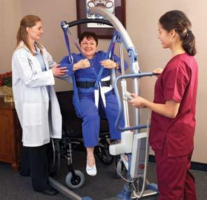 FLOOR LIFTS 1 S 440 A sit-to-stand lift designed to assist patients from a seated position to standing.