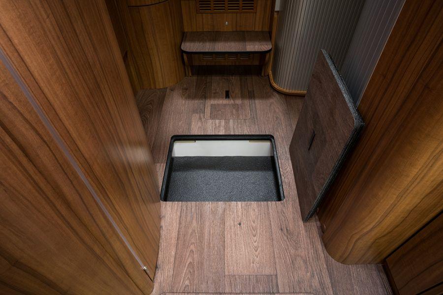 The cellar compartment in the double floor of the Hymermobil StarLine is the ideal storage space for