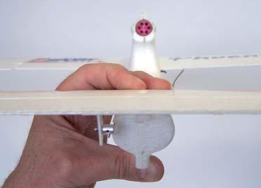 12. Use 5 minute epoxy glue (available separately), and press the horizontal tail into position and hold for at least