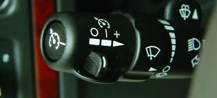 Attain the speed you want to cruise at. 3. Press in the Set button ( ) at the end of the multifunction lever on the left side of the steering column. 4. Take your foot off the accelerator pedal. 5.