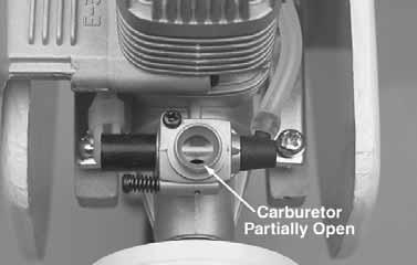 not fully closed, loosen the screw on the screw-lock connector on the throttle servo arm and move the pushrod forward until the carburetor is closed. Securely tighten the screw. 4.