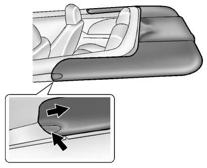 4-4 Storage Removal 6. Push the edge (2) of the center of the tonneau cover (1) under the vehicle trim (3). 1. Grip the tonneau cover at the notch and pull back to release the tab on both sides. 2.