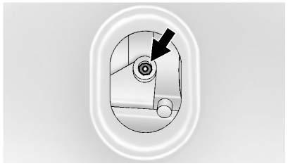 After the convertible top is completely raised, release the convertible top front latch from the lock position by pulling down and turning it clockwise. 10.