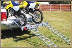 of Class 4 hitch; do not exceed your vehicles hitch capacity -All quads or ATV s must be properly tied down by all 4 corners, with approved Tie Down Straps -Ramp carrying capacity; no more than 70%